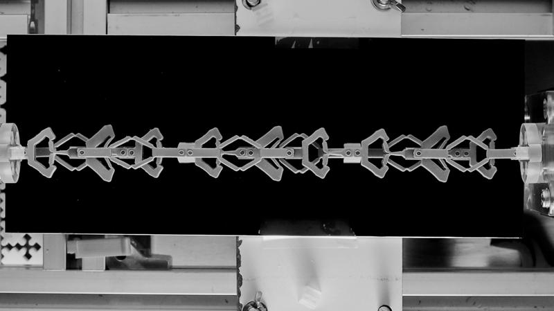 Three serially-coupled countersnapping elements, before avalanche (state 000).